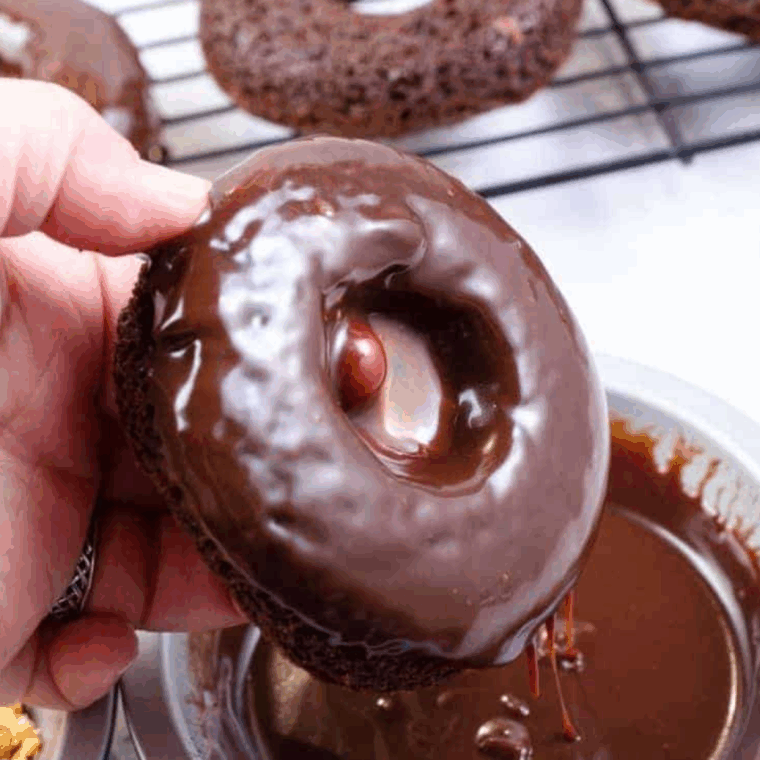 Chocolate cake mix donuts cooked in the air fryer, golden and ready to serve.