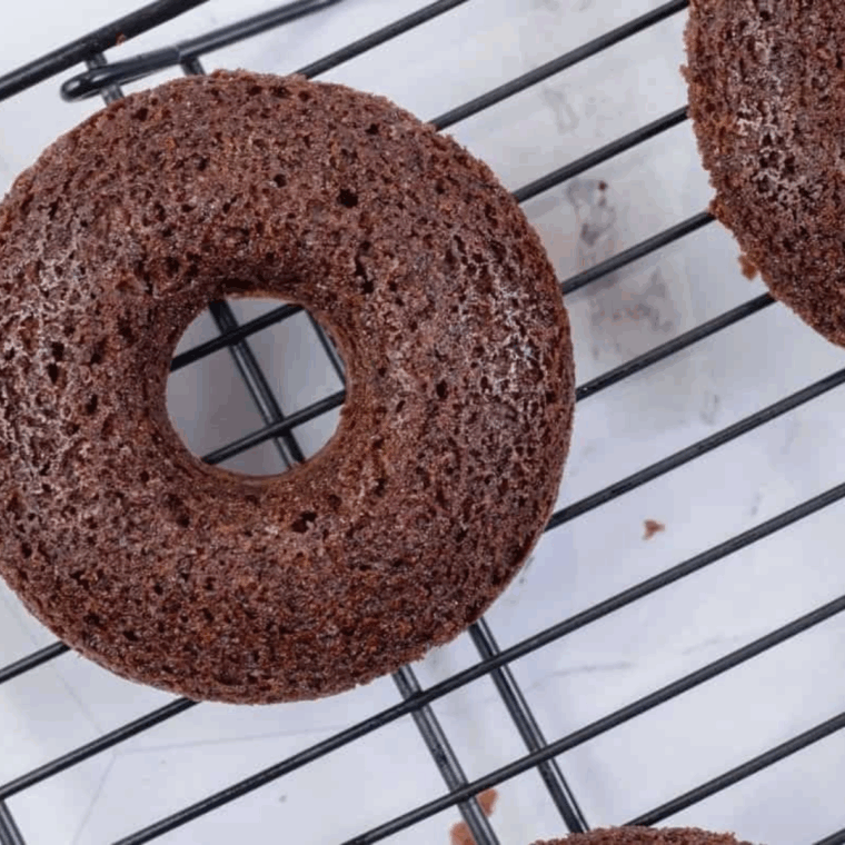 Cooked Chocolate Cake Mix Donuts on the cooling rack.
