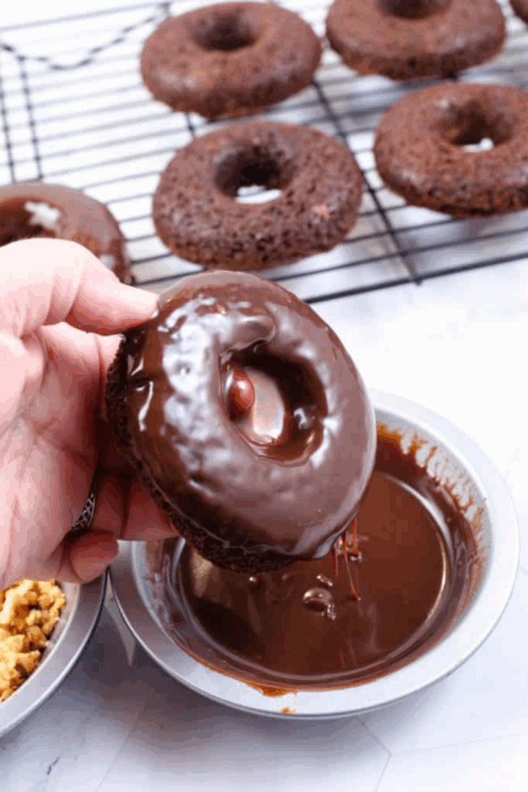 Golden chocolate cake mix donuts cooked in the air fryer, ready to serve.
