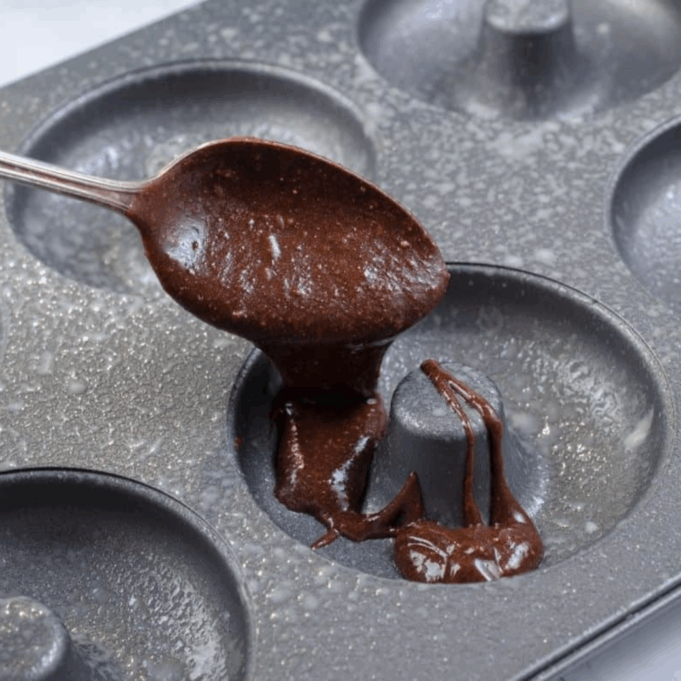 Chocolate Cake Mix Donut batter into the baking donut pna.