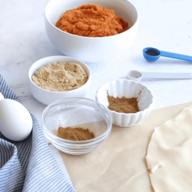 Ingredients for pumpkin nut bread: pumpkin pur&eacute;e, flour, sugar, eggs, oil, spices, and chopped pecans