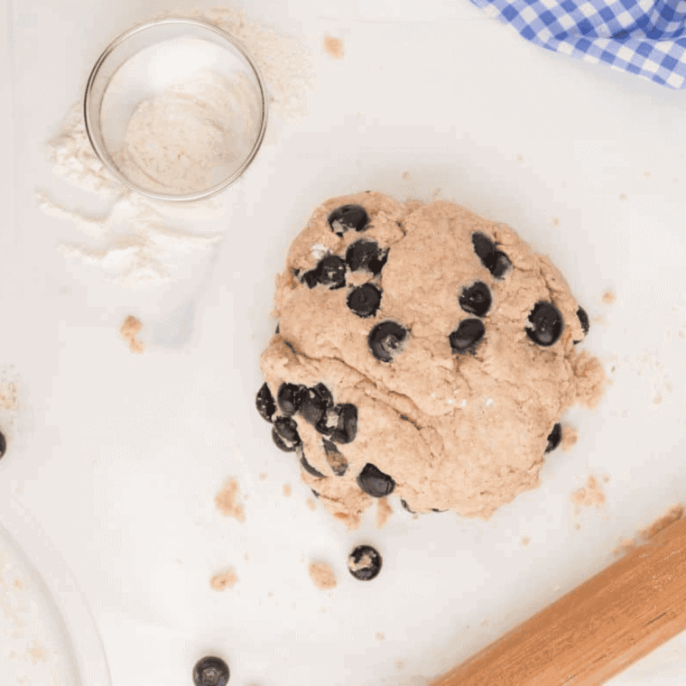 Cutting biscuits with a 2 3/4-inch cutter and arranging them in a greased air fryer, set to 350&deg;F for 6&ndash;9 minutes.