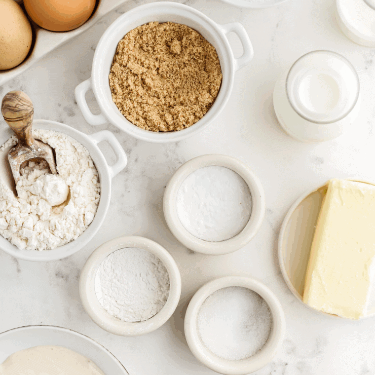 Ingredients needed for Easy Air Fryer Garlic Herb Quick Bread on kitchen table.