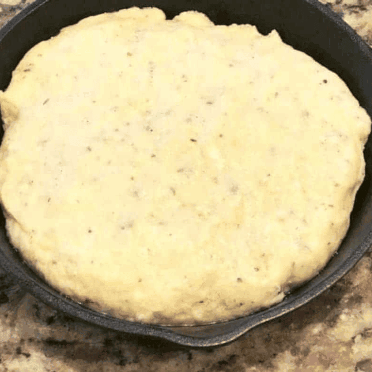 Kneaded bread dough shaped in greased pan, ready in air fryer at 350&deg;F for 5&ndash;7 minutes