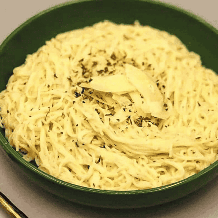Finished Instant Pot Pasta Roni resting in the pot with thickened creamy sauce, ready to serve