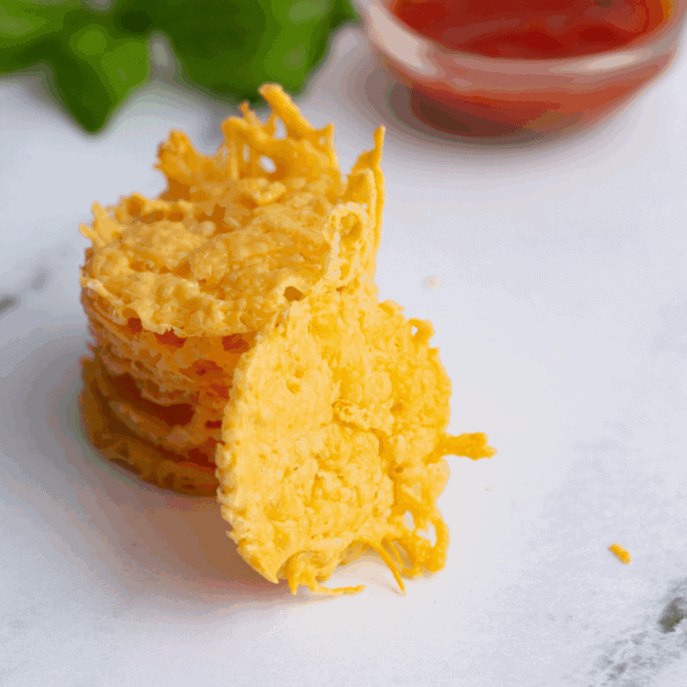 Golden, crispy air fryer Parmesan crisps fresh out of the air fryer.