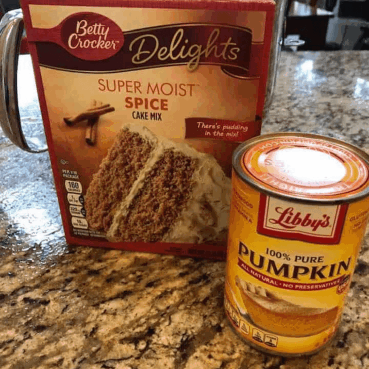 Ingredients needed for Air Fryer Pumpkin Spice Bundt Cake on kitchen table.