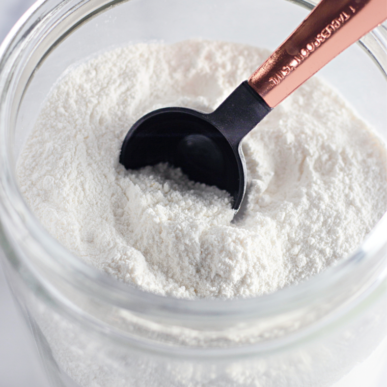 Easy Air Fryer Vanilla Mug Cake ingredients needed on kitchen table.