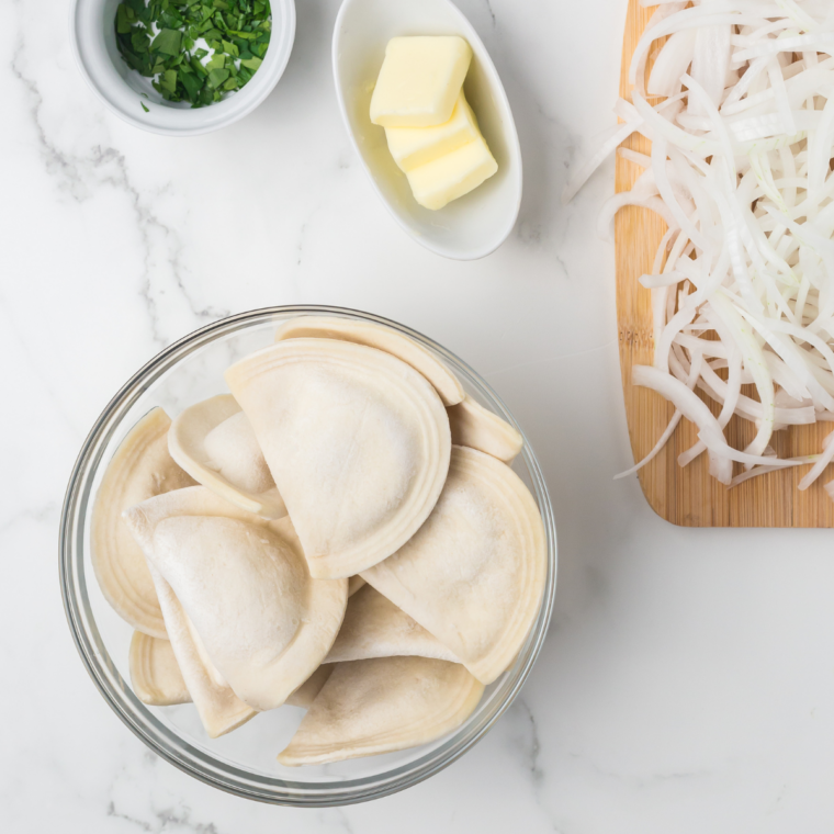 Ingredients needed for Easy Air Fryer Breaded Pierogies on kitchen table.