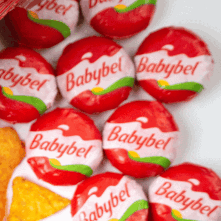 Ingredients needed for Easy Air Fryer Babybel Cheese on kitchen table.