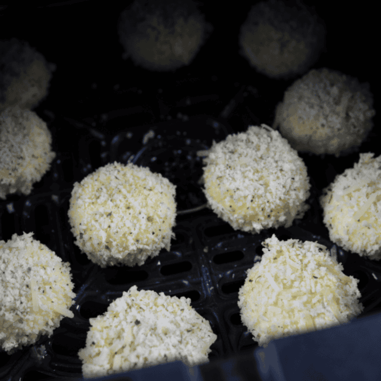Place coated Babybel Cheese in the air fryer basket.