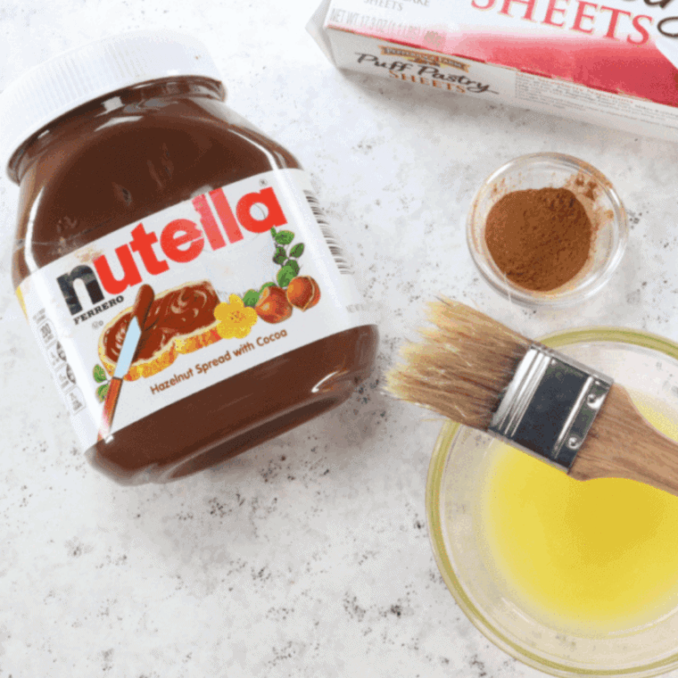 Ingredients needed for Easy Air Fryer Nutella Cake (Three Ingredients) on kitchen table.