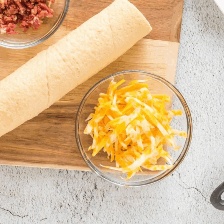 Ingredients needed for Air Fryer Cheese Stuffed Crescents Rolls on kitchen table.