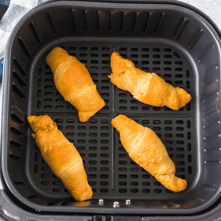 Place Easy Air Fryer Cheese Stuffed Crescents Rolls in the air fryer basket.