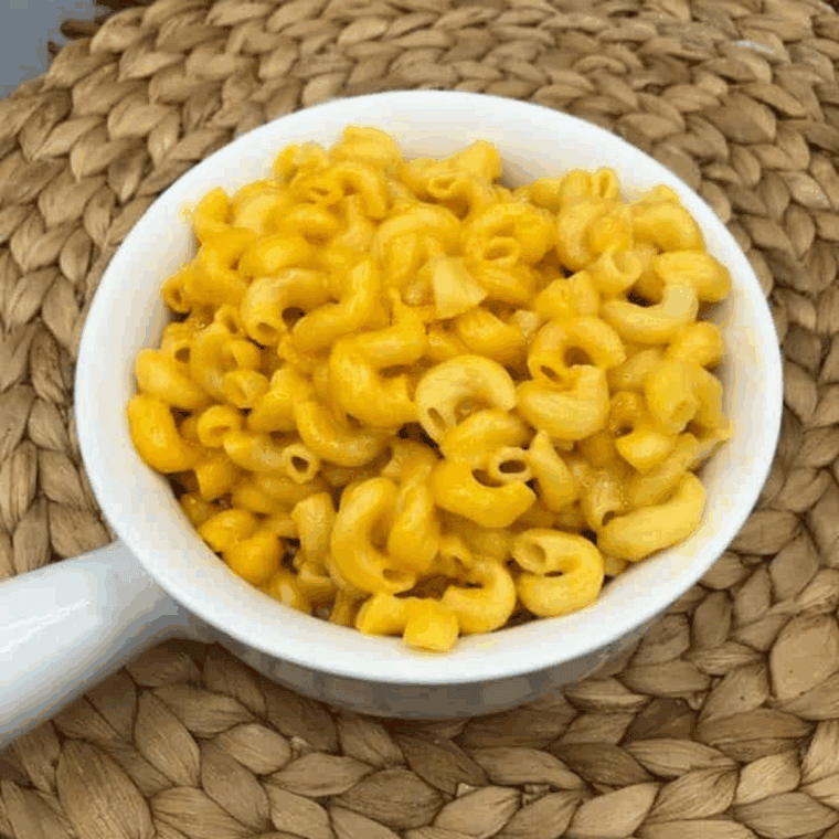 Bowl of creamy Instant Pot copycat Kraft mac and cheese with tender elbow macaroni and rich cheese sauce