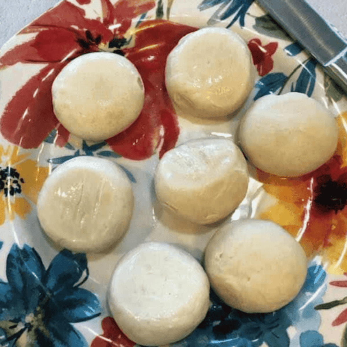 Ingredients needed for Air Fryer Single Serve Monkey Bread on kitchen table.