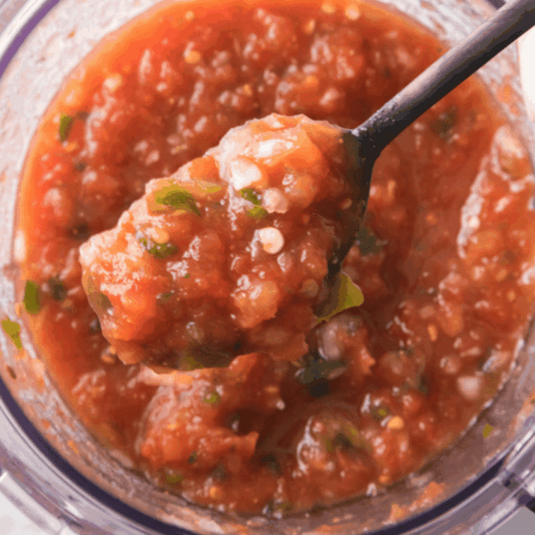 Roasted air fryer salsa in a bowl with tortilla chips