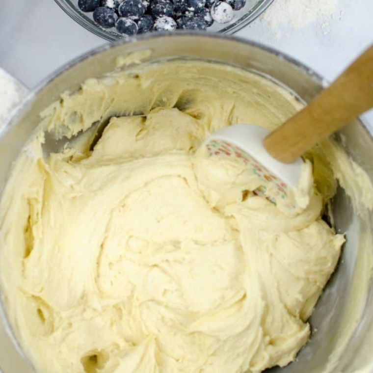 (Combine the Dry Ingredients): Flour, baking powder, and salt whisked together in a separate bowl to evenly distribute leavening.