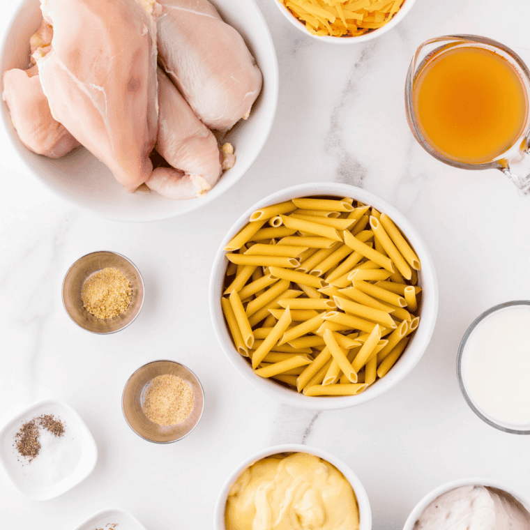 Ingredients needed for Instant Pot Cajun Chicken Alfredo (Creamy, One-Pot, 30 Minutes) on kitchen table.