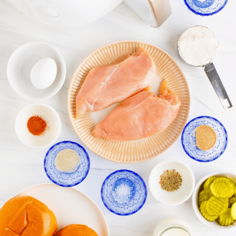 Ingredients needed for Air Fryer Popeyes Chicken Sandwich (Copycat) on kitchen table.