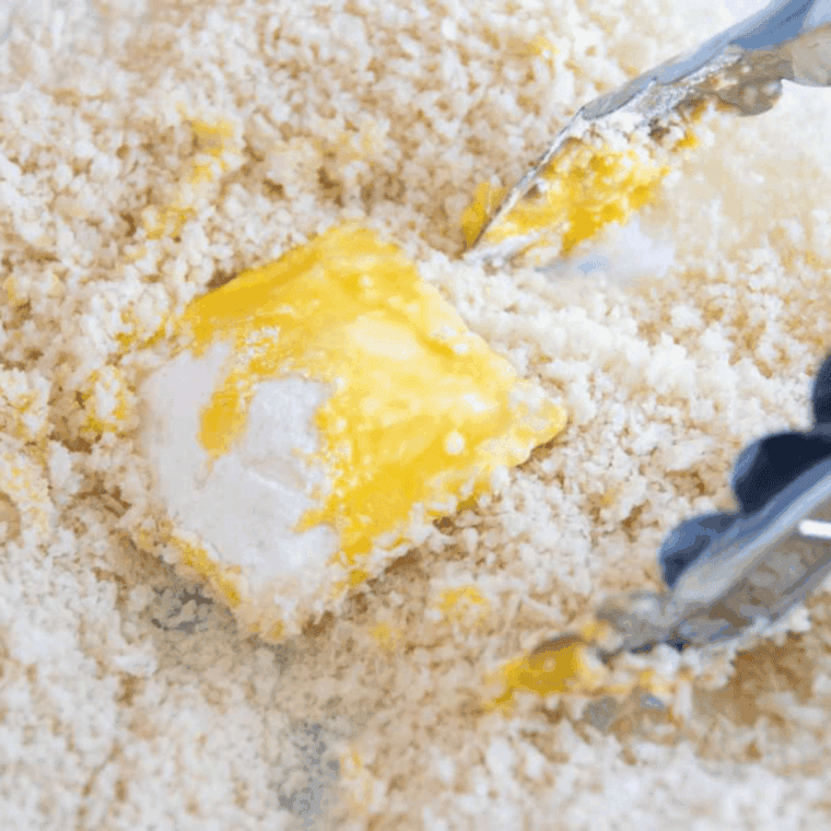 Dip in the breadcrumbs or panko breadcrumbs.