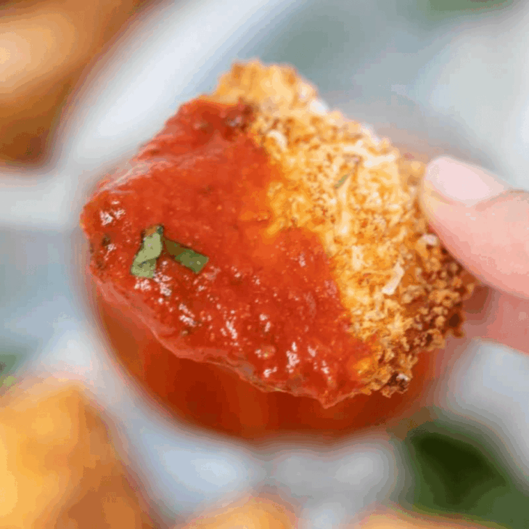 Crispy golden Old Spaghetti Factory-style toasted ravioli served with marinara sauce