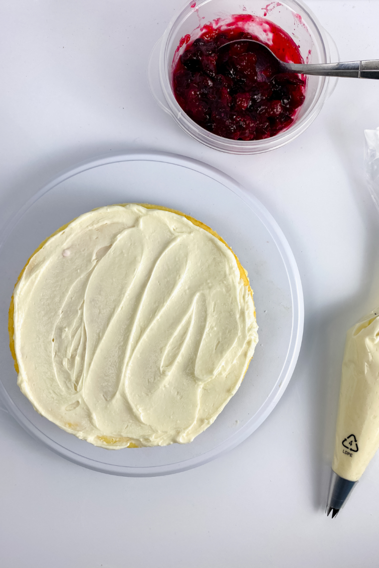 Sliced strawberry cheesecake served with clean cut slices on plate