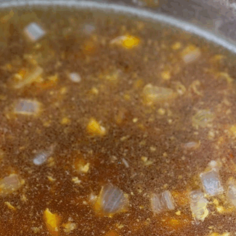 Sautéing garlic, onion, and diced chicken breast in Instant Pot