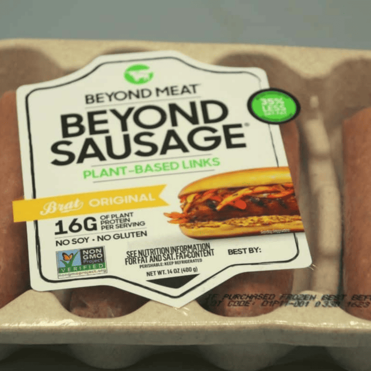 Ingredients needed for Air Fryer Beyond Sausage on kitchen table.