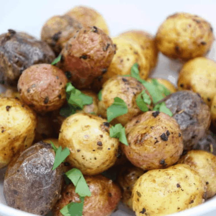 Golden crispy Trader Joe&rsquo;s mini potatoes cooked in the air fryer.