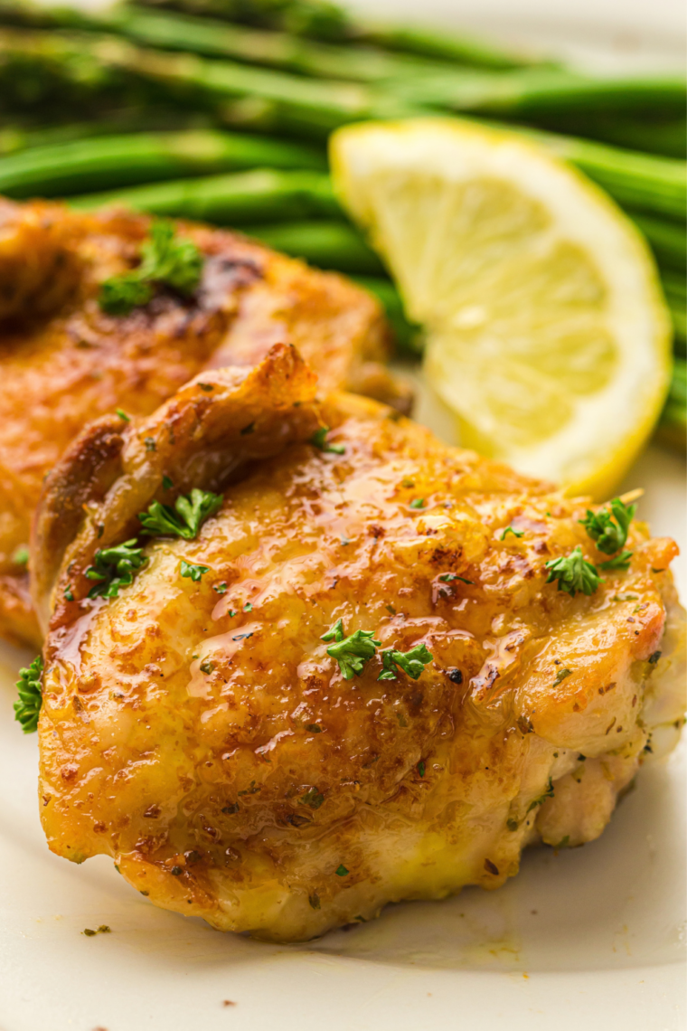 Crispy golden turkey thighs in an air fryer basket after cooking