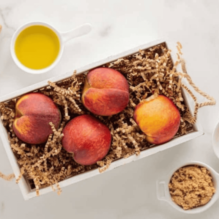 Ingredients needed for Easy Air Fryer Peach Cobbler For Two on kitchen table.