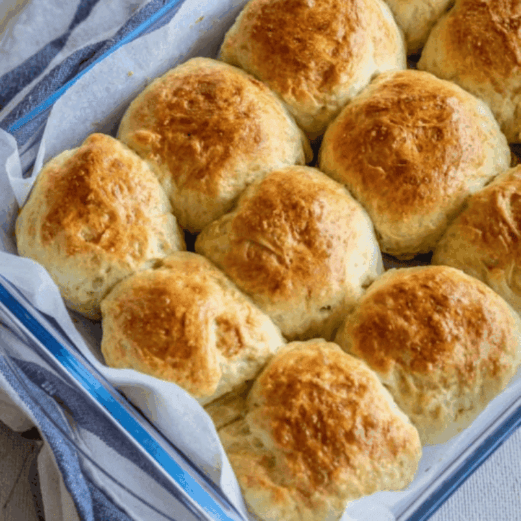 golden brown soft dinner rolls freshly made in an Instant Pot