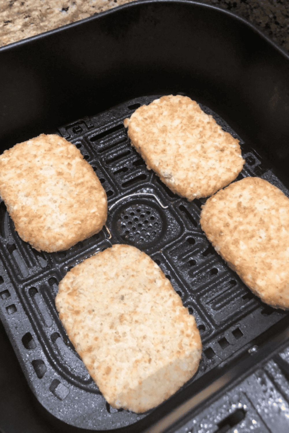 Air fryer hash browns cooked from frozen until crunchy outside and soft inside for a fast and simple breakfast