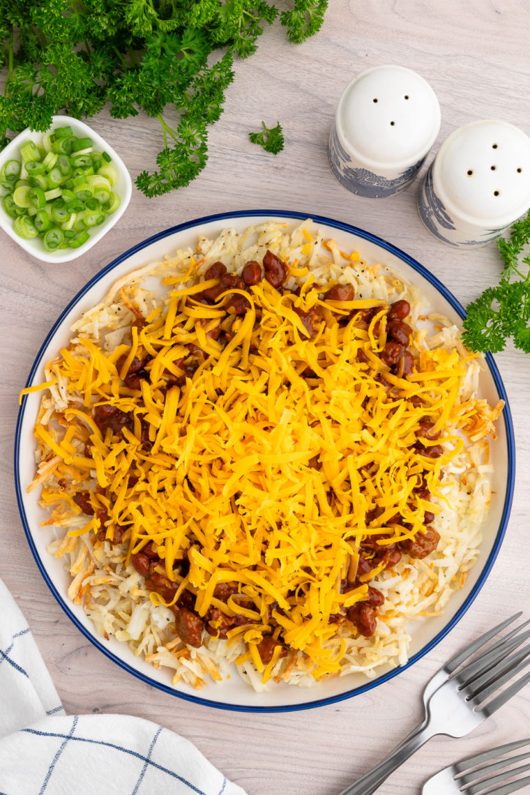 Air fryer shredded hash browns cooked until golden brown and crispy diner-style potatoes ready in 18 minutes for easy breakfast side