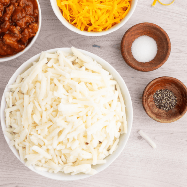 Ingredients needed for Shredded Hash Browns in Air Fryer (Crispy Diner-Style &mdash; Ready in 18 Minutes!) on kitchen table.