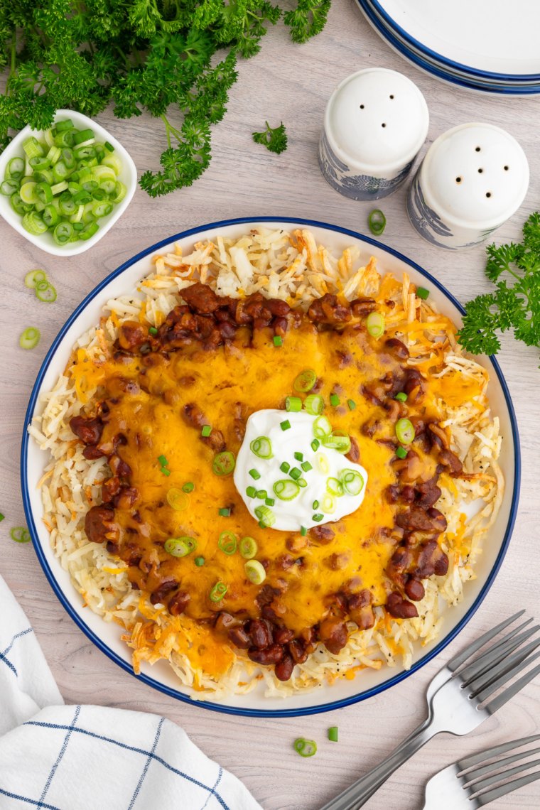 Air fryer shredded hash browns cooked until golden brown and crispy diner-style potatoes ready in 18 minutes for easy breakfast side