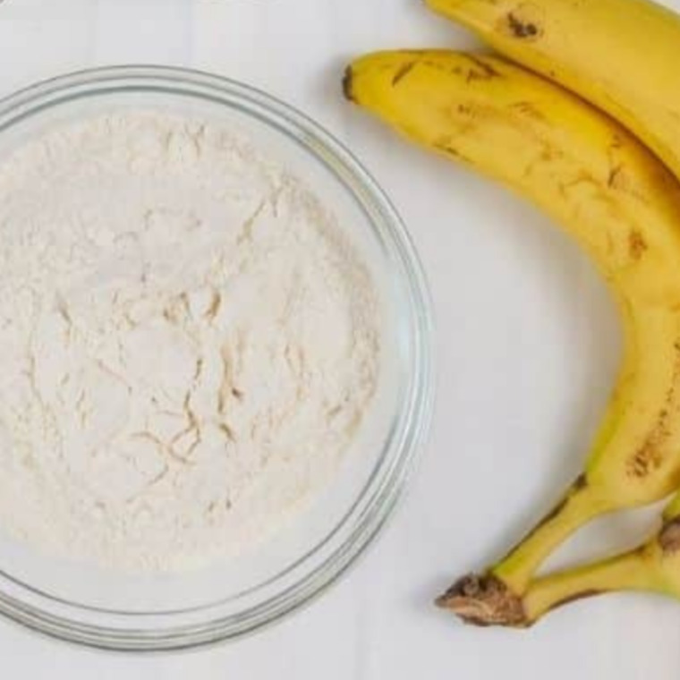 Ingredients for air fryer banana bread mug cake: ripe banana, flour, sugar, baking powder, vanilla, and salt