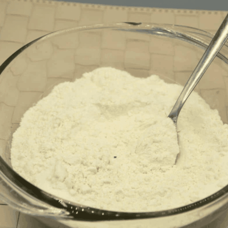 In a large bowl, combine flour, sugar, baking powder, baking soda, and salt, mixing thoroughly.