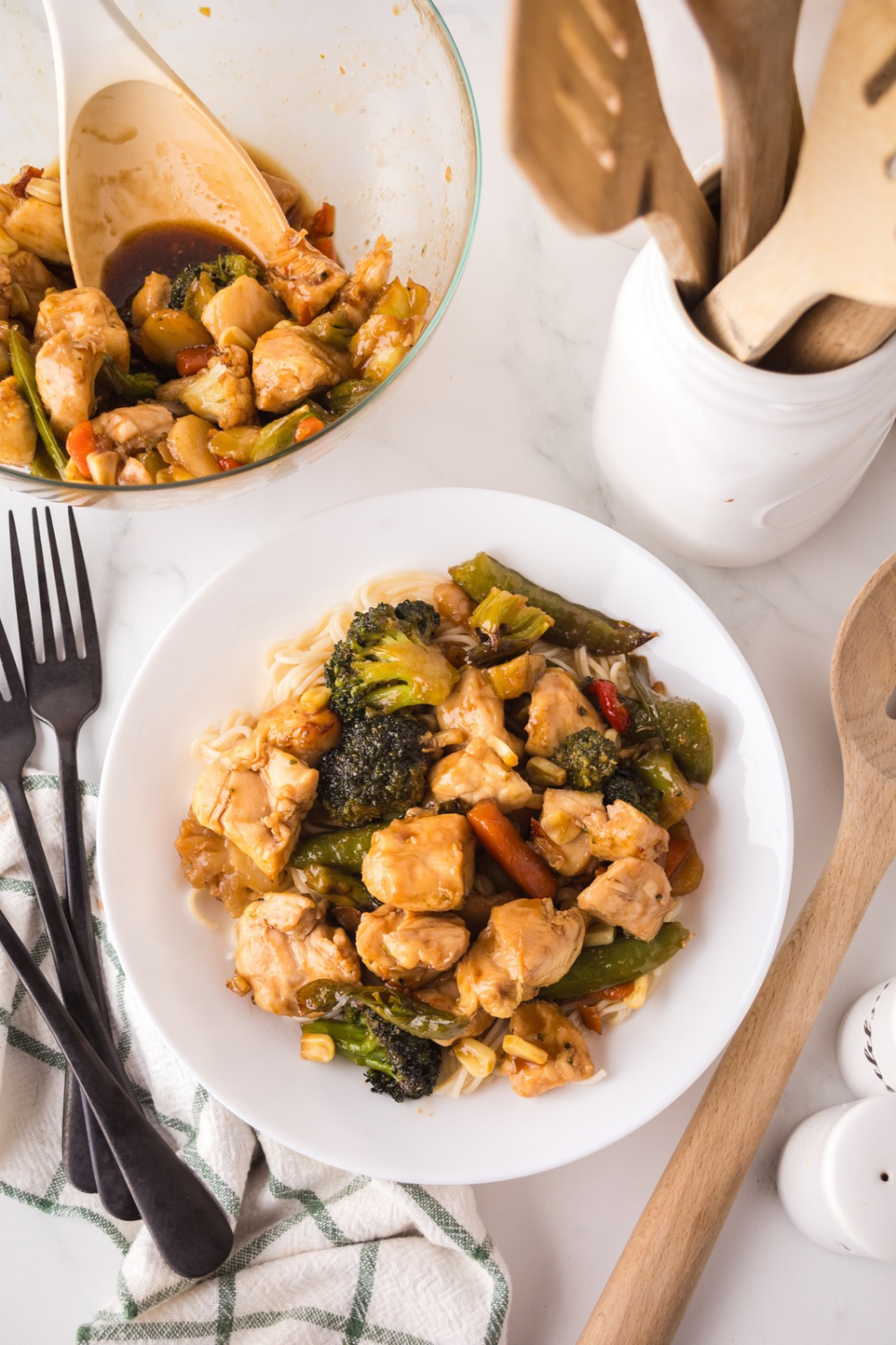 Plate of honey teriyaki chicken and broccoli with steamed rice, a healthy air fryer dinner