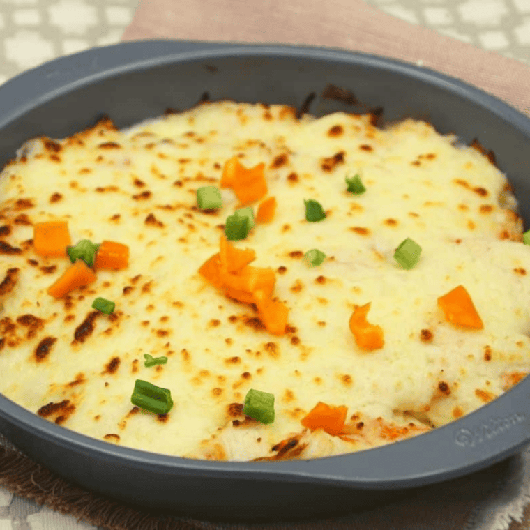 Air Fryer Chinese Buffet Crab Casserole with melted cheese and golden edges.