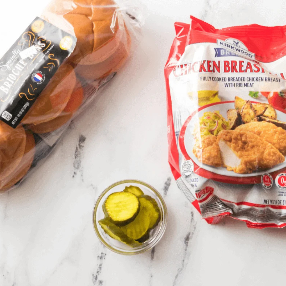 Ingredients for Aldi Red Bag Chicken sandwiches: Kirkwood breaded chicken fillets, brioche buns, and dill pickles