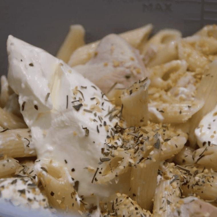 Ninja Foodi pressure cooker sealed with valve set to seal position, pressure cooking chicken alfredo on high for 4 minutes