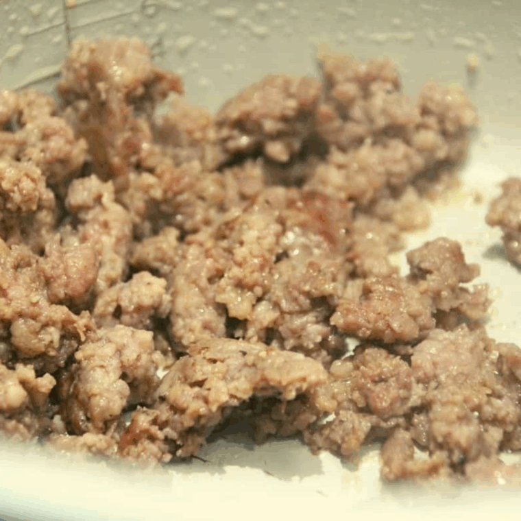 Ground sausage browning in the Ninja Foodi using the saut&eacute; function