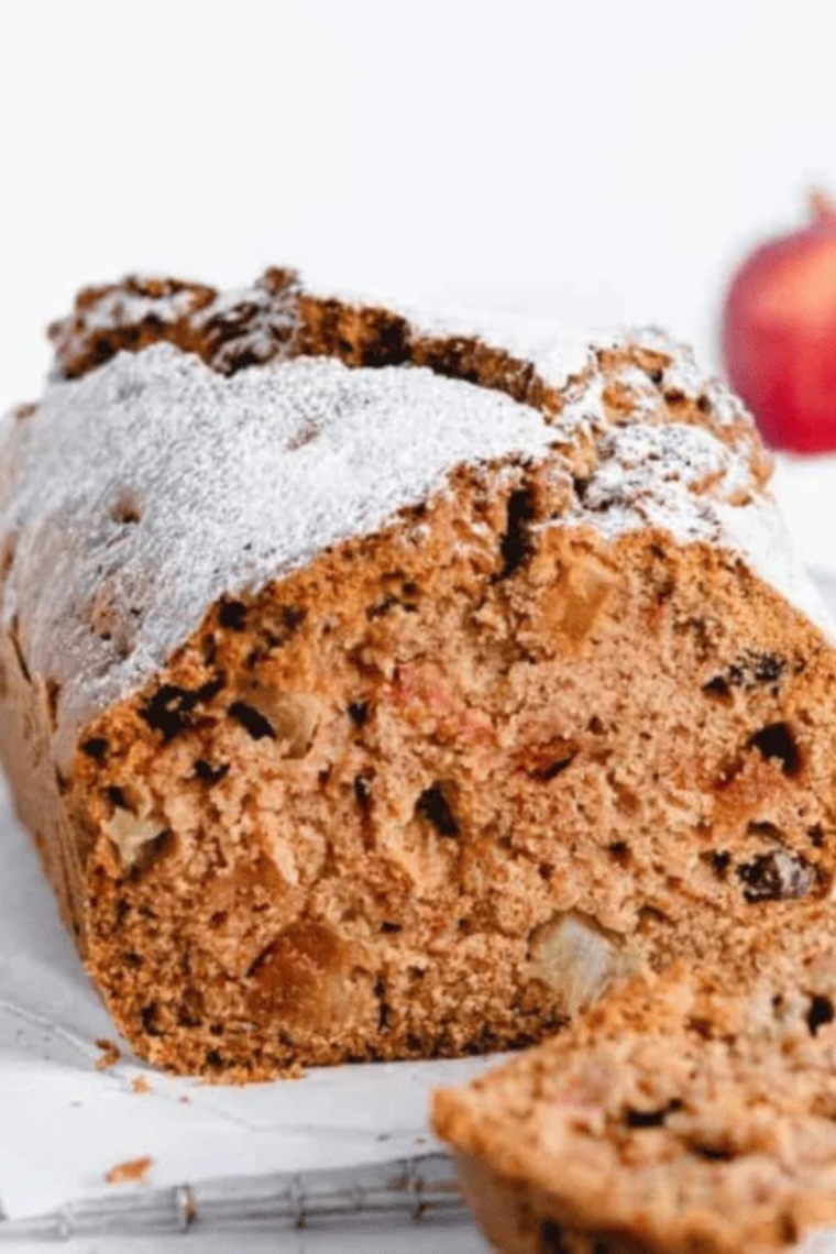 Baked apple cranberry bread loaves cooling on a wire rack