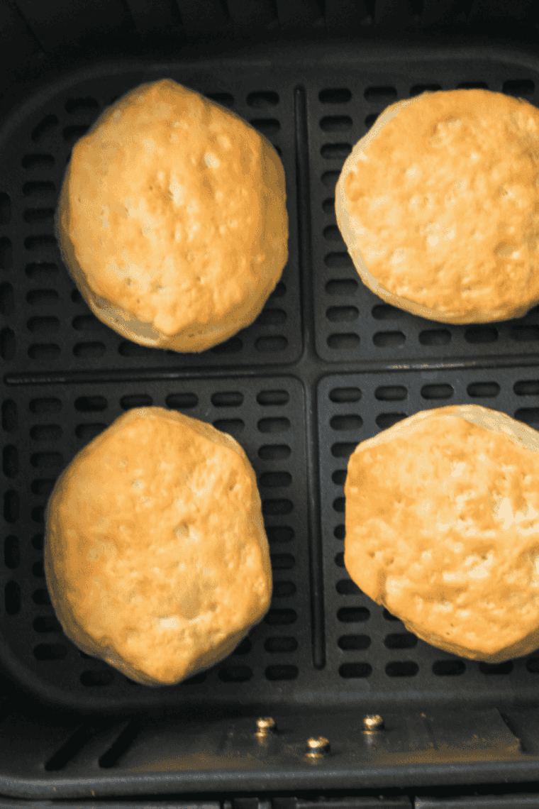  Air fryer display set to 330&deg;F (165&deg;C), highlighting the correct lower temperature for evenly cooking canned biscuits without burning the outside.