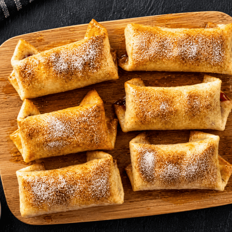 Air fryer cherry chimichangas served warm with vanilla ice cream
