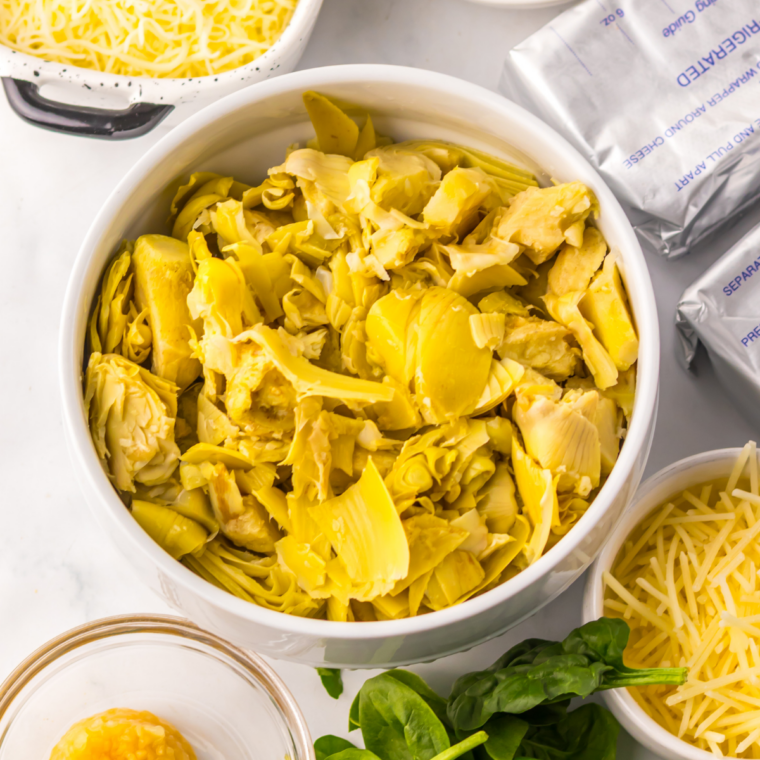 Ingredients for air fryer frozen artichokes: frozen artichoke hearts, olive oil, salt, and pepper