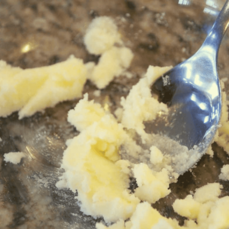 Softened butter and granulated sugar creamed together in a small mixing bowl