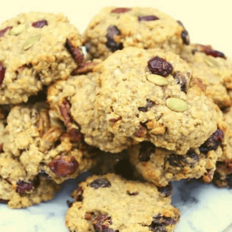 Healthy and chewy air fryer breakfast cookies with oats, nuts, and dried fruit.